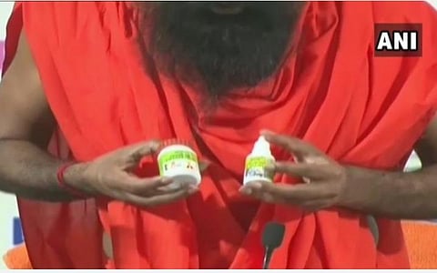 பதஞ்சலி நிறுவனம் கரோனாவுக்கு ஆயுர்வேத மருந்தை கண்டுபிடித்து இருக்கலாம்; மத்திய அரசு சட்டப்படி தான் செயல்பட முடியும்: மத்திய அமைச்சர் விளக்கம்