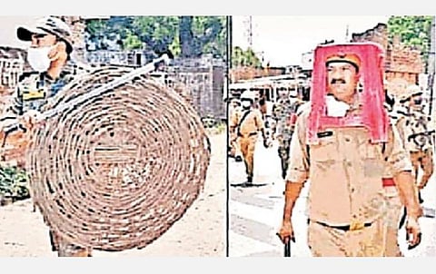 உத்தர பிரதேச மாநிலம் உன்னாவ் பகுதியில் கல்வீச்சில் இருந்து தப்புவதற்காக பிளாஸ்டிக் ஸ்டூல், மூங்கில் கூடையுடன் சென்ற 4 போலீஸார் சஸ்பெண்ட்