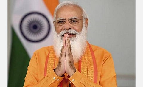 கரோனா தடுப்பூசியை அடுத்து 5 கிலோ இலவச ரேஷன் பையில் மோடி படம்