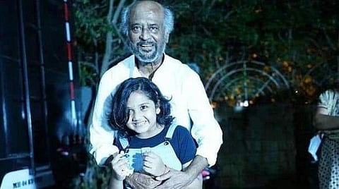குட்டி ரசிகையுடன் ரஜினி