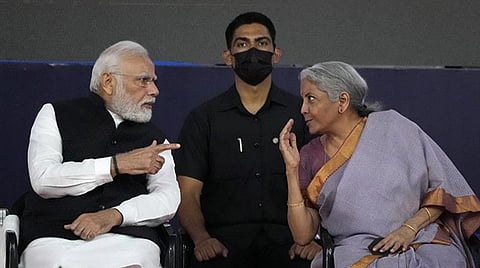 பிரதமர் மோடி மற்றும் நிதி அமைச்சர் நிர்மலா சீதாராமன்