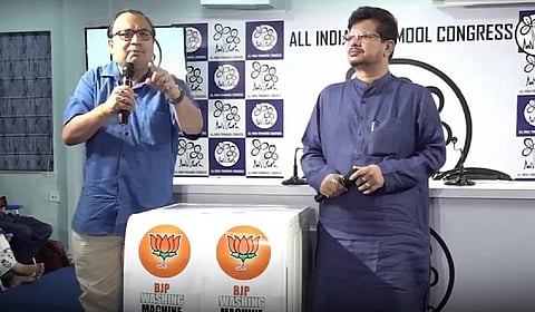 பிரஃபுல் படேலை சலவை செய்த ‘பாஜக வாஷிங் மெஷின்’ - திரிணமூல் காங். ‘டெமோ’வுடன் கேலி