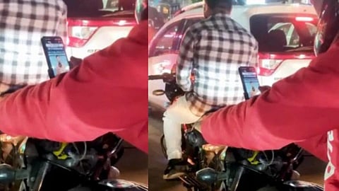 போக்குவரத்து சிக்னலில் கிடைத்த நேரத்தில் யுபிஎஸ்சி தேர்வுக்கு தயாரான சொமோட்டா டெலிவரி இளைஞர்