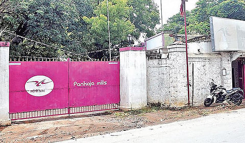 கோவை ராமநாதபுரம் பகுதியில் அமைந்துள்ள என்டிசி நூற்பாலை. (கோப்பு படம்)