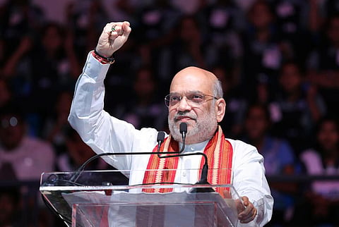 வங்கதேசத்தில் இருந்து ஊடுருவியர்களை பாதுகாக்க ராகுல் காந்தி முயற்சி: அமித் ஷா குற்றச்சாட்டு