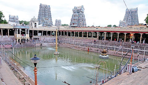 மோசடியாகப் பத்திரப் பதிவு, பட்டா மாற்றி ரூ.60 கோடி மதிப்புள்ள மதுரை மீனாட்சி கோயில் நிலம் அபகரிப்பு