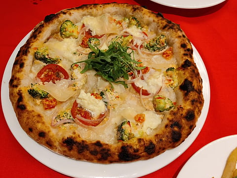 In frame: Broccolini Pizza