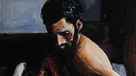 Man reading by the window