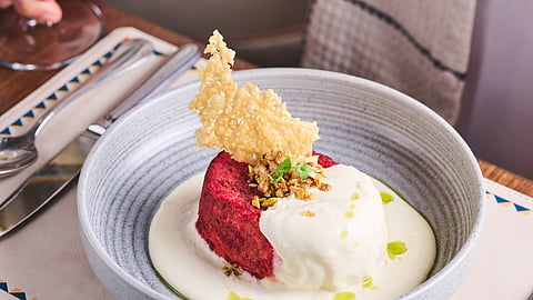 Italian style double baked beetroot souffle, tallegio cream & caramalised nuts