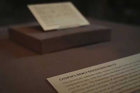 A previously unknown musical manuscript, possibly by Frederic Chopin, rests in a display case after it was discovered at The Morgan Library & Museum
