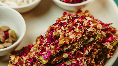 Jaggery chikkis garnished with rose petals