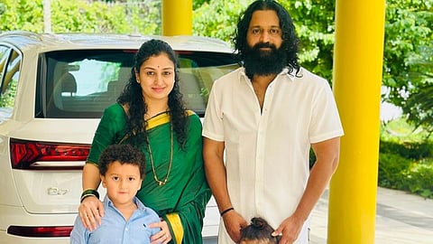 Rishab Shetty (R) with his family