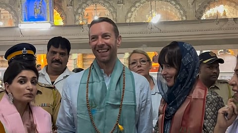 Chris Martin and Dakota Johnson