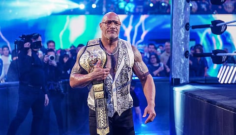 Fans are speculating if The Rock will host Wrestlemania.