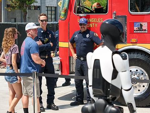 Elon Musk reshared the robot clip on X, said: “This will become normal in a few years”