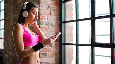 How music can trick your brain into less fatigue during exercise