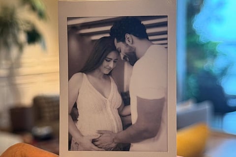 Katrina and Vicky in an adorable polaroid as they reveal their pregnancy news