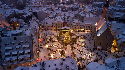 What is the Estonian tradition of eating seven meals a day for New Year?