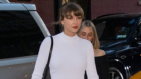Taylor Swift's Retrofête dress turned a simple girls’ night into fashion’s latest bridal-inspired moment