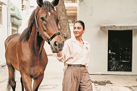 Regena Cassandra adopts retired racehorse