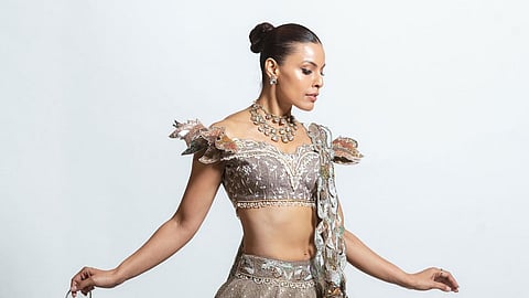 A grey and silver Banarasi bridal lehenga with gotapatti embroidery from the Gulzaar collection by Daamann by Mohit Falod