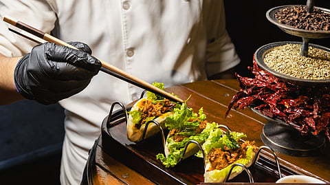 From crispy tofu to tempura prawns, every steamed bun arrives with a kimchi designed to complete the story