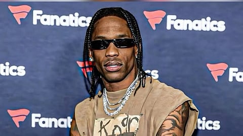 Travis Scott reportedly became involved in a brief bottle-throwing confrontation at Zero Bond