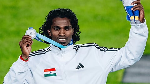 Praveen Chithravel battled freezing conditions in Glasgow, produced a season-defining 16.58m jump