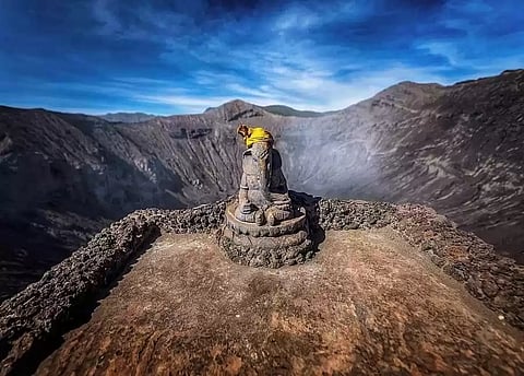 This 700-year-old Ganesha idol sits at the edge of an active volcano in Indonesia