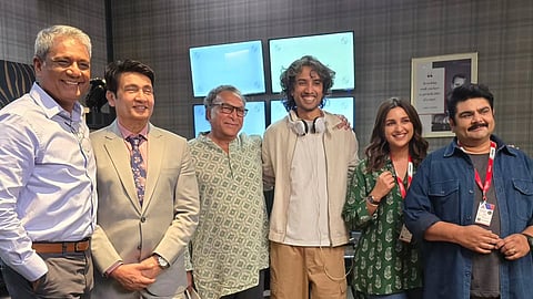 Filmmaker Dhruv Tripathi (third from right) poses with the cast and crew of Reporting Live.