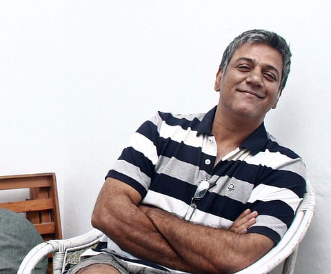 Mike Muthu steps off stage