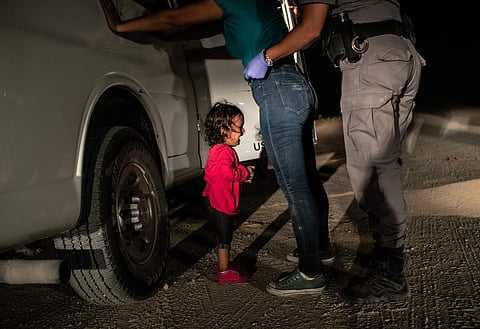 Crying Girl on the Border, photo by John Moore/Getty Images/World Press Photo of the Year