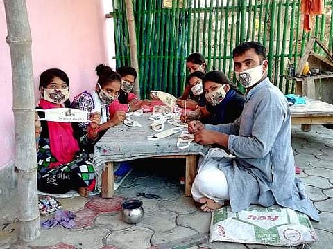 Bihar couple use Madhubani art on face masks to write anti-coronavirus slogans