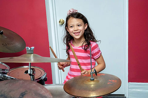 A young drummer at Bloomingdale School of Music