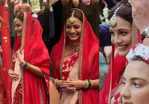 Dia Mirza looks stunning in a red bridal ensemble. (Image courtesy: Viral Bhayani)