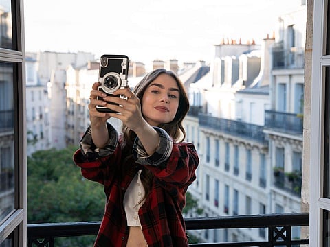 Lilly Collins as Emily Cooper in Emily in Paris