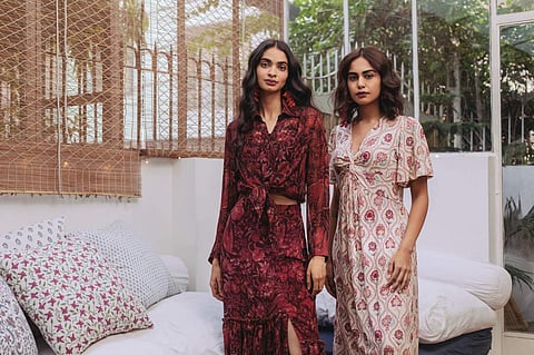 Models sporting looks from the Aarké collection