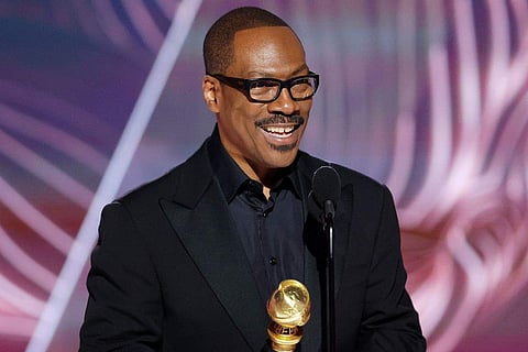 Tracy Morgan and Jamie Lee Curtis presented the Cecil B. DeMille award to Eddie