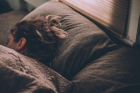 Experts suggest creating a bedtime routine that includes relaxing activities like taking a bath or shower