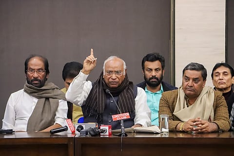 Leader of Opposition in the Rajya Sabha and Congress President Mallikarjun Kharge with MPs from INDIA bloc parties addresses a press conference, in New Delhi, Wednesday, Dec. 11, 2024.