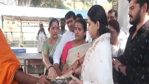 Pavitra Gowda and family members at temple