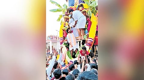 Infant tossing ritual under way in a Koppal village