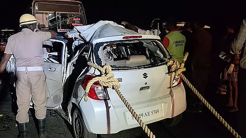the car was crushed under the lower part of the bus