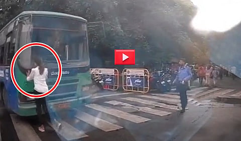 ಸ್ವಲ್ಪದರಲ್ಲೆ ಯುವತಿ ಬಚಾವ್: ರಸ್ತೆಮಧ್ಯೆ BMTC ಬಸ್ ಚಾಲಕನ ಹುಚ್ಚಾಟ; Video Viral!
