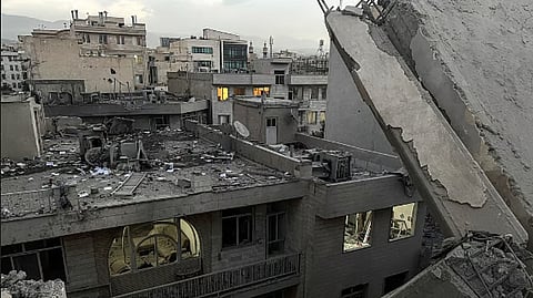 Debris and rubble at the scene of a building that was hit by an Israeli strike in Tehran