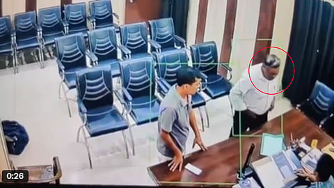 headmaster thrashes education officer with belt