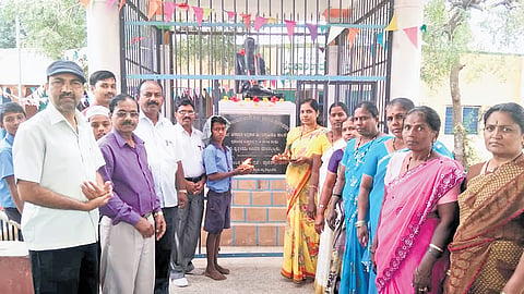Residents of Jakkali village in Gadag district pray to Mahatma Gandhi in a temple