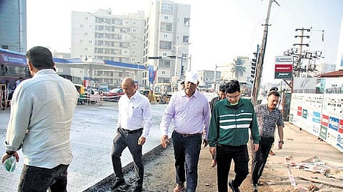 GBA Chief Commissioner Maheshwar Rao, along with officials, inspects white-topping work on Hennur-Bagalur Road on Wednesday