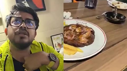 The video also captures an exchange between Sayak and the restaurant employee.
