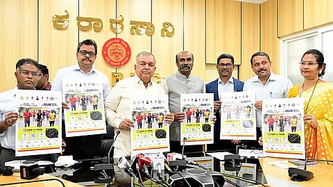Transport Minister Ramalinga Reddy releases a poster for the ‘5K Safe-A-Thon’ road safety awareness campaign in Bengaluru on Thursday.